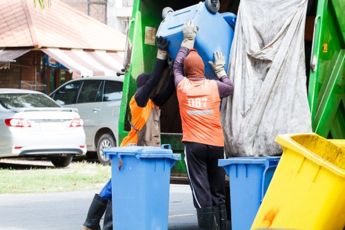 Vehicle being checked and secured before transporting waste from a clearance